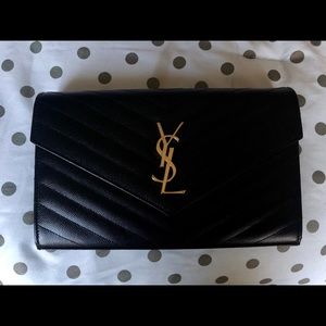 YSL MONOGRAM CHAIN WALLET IN EMBOSSED LEATHER